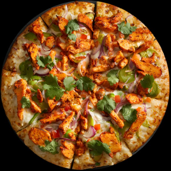 Masala Slice's Indian-style pizza, topped with chicken tikka, red onions, green peppers, and cilantro.